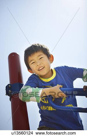 Boy Playing in Playground View Large Photo Image Picture - Boy Playing in Playground. Fotosearch