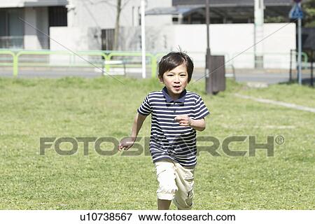 Boy Running in Park View Large Photo Image Stock Photo - Boy Running in Park. Fotosearch