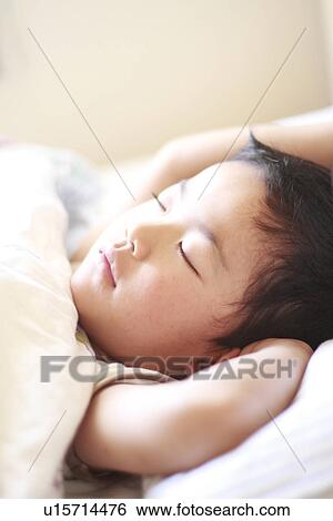 Stock Photograph - Boy Sleeping. Fotosearch