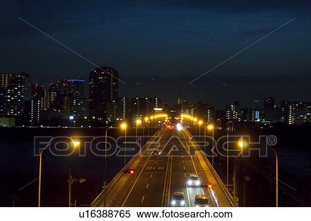Stock Photography - Bridge Over Sumida River at Night. Fotosearch