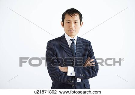 Stock Image - Businessman Arms Crossed. Fotosearch