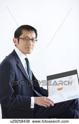 Stock Photo - Businessman with Portfolio. Fotosearch