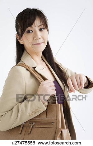 Businesswoman Checking Time View Large Photo Image Stock Photo - Businesswoman Checking Time. Fotosearch