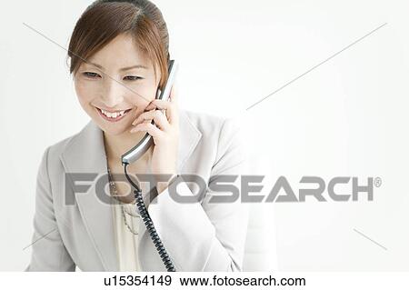 Stock Photo - Businesswoman on Phone. Fotosearch