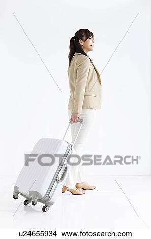 Businesswoman Traveling View Large Photo Image Picture - Businesswoman Traveling. Fotosearch