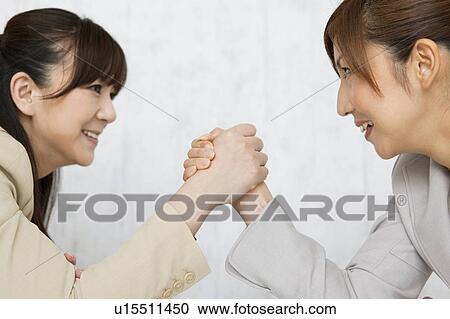 Businesswomen Arm Wrestling View Large Photo Image Stock Image - Businesswomen Arm Wrestling. Fotosearch