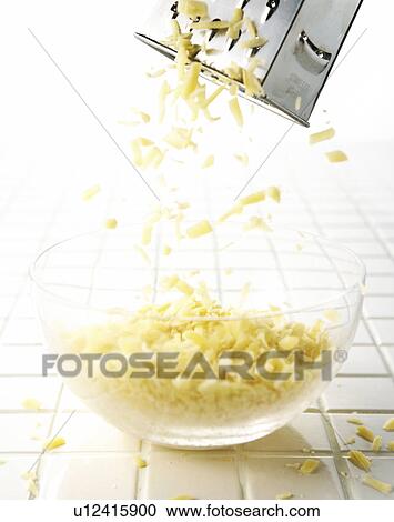 Cheese Being Grated View Large Photo Image Stock Image - Cheese Being Grated. Fotosearch