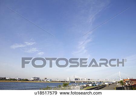 Stock Photo - Clouds Over Tokyo. Fotosearch