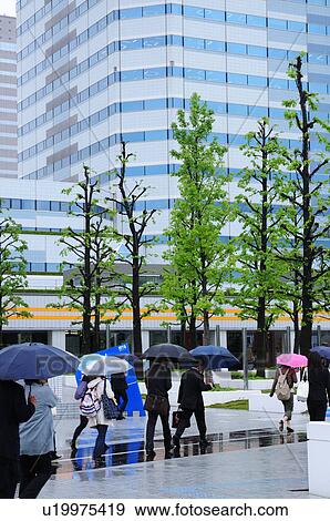 Commuters in Rain View Large Photo Image Stock Photo - Commuters in Rain. Fotosearch