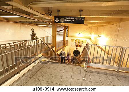 Picture - Commuters Walking Down Steps in Subway Station. Fotosearch