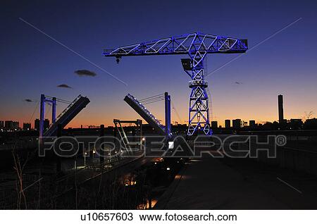 Stock Image - Crane and bridge at Toyosu park, Koto ward, Tokyo Prefecture, Honshu, Japan . Fotosearch