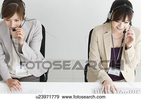Customer Representatives View Large Photo Image Stock Photo - Customer Representatives. Fotosearch