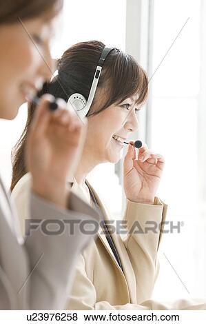 Stock Photo - Customer Representatives. Fotosearch