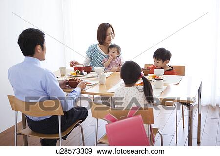 Family of Five Having Breakfast View Large Photo Image Stock Photo - Family of Five Having Breakfast. Fotosearch