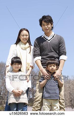Family of Four in Park View Large Photo Image Stock Image - Family of Four in Park. Fotosearch