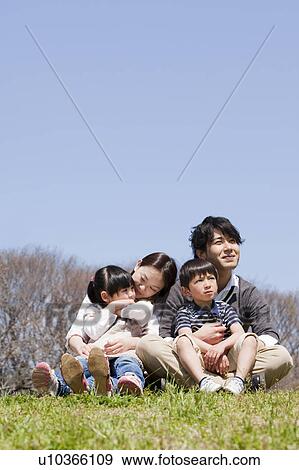 Family of Four in Park View Large Photo Image Stock Photo - Family of Four in Park. Fotosearch