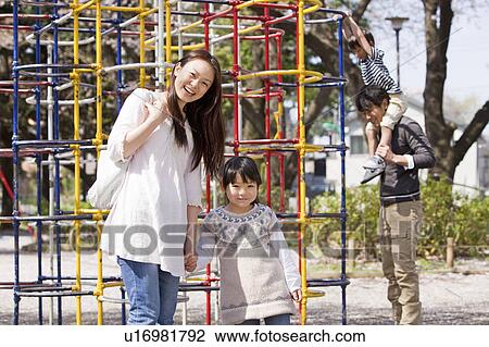 Family of Four in Playground View Large Photo Image Stock Image - Family of Four in Playground. Fotosearch