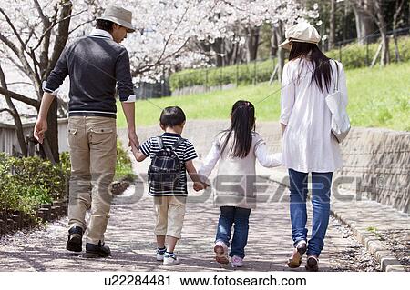 Family of Four Walking in Park View Large Photo Image Stock Image - Family of Four Walking in Park. Fotosearch