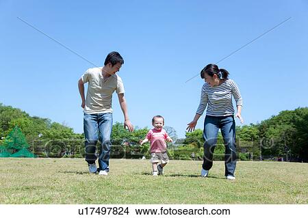 Family of Three in Park View Large Photo Image Picture - Family of Three in Park. Fotosearch