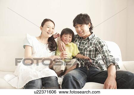 Family of Three on Sofa View Large Photo Image Stock Photograph - Family of Three on Sofa. Fotosearch