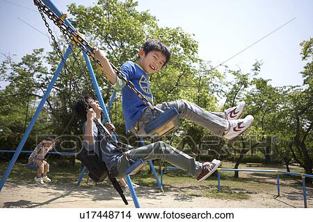 Family Swinging View Large Photo Image Picture - Family Swinging. Fotosearch