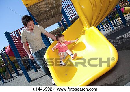 Father and Baby Girl Playing in Playground View Large Photo Image Stock Photo - Father and Baby Girl Playing in Playground. Fotosearch