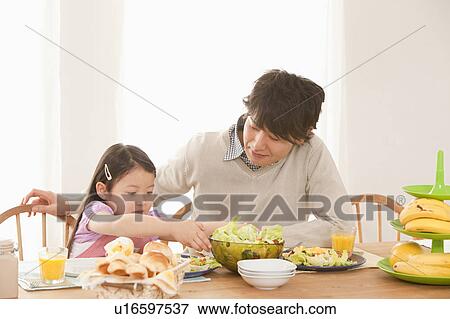 Father and Daughter at Breakfast Table View Large Photo Image Stock Photo - Father and Daughter at Breakfast Table. Fotosearch