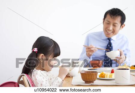 Father and Daughter Having Breakfast View Large Photo Image Stock Image - Father and Daughter Having Breakfast. Fotosearch