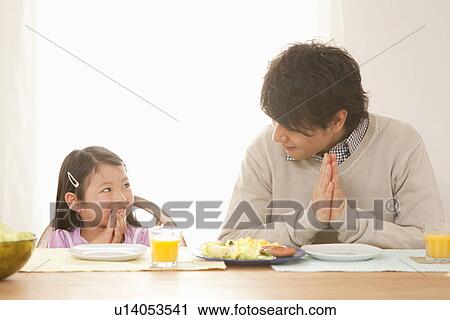 Father and Daughter Praying at Breakfast Table View Large Photo Image Stock Image - Father and Daughter Praying at Breakfast Table. Fotosearch