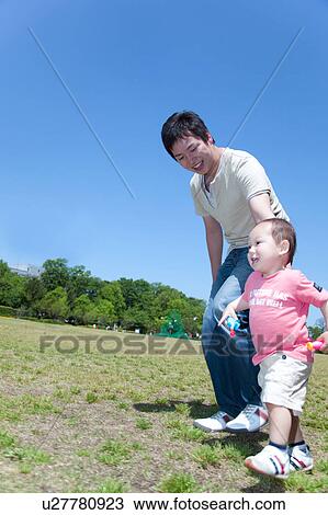 Father and Son in Park View Large Photo Image Stock Image - Father and Son in Park. Fotosearch