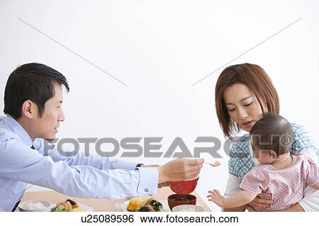 Father Feeding Baby Girl View Large Photo Image Stock Photograph - Father Feeding Baby Girl. Fotosearch