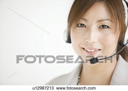 Stock Image - Female Customer Representative. Fotosearch