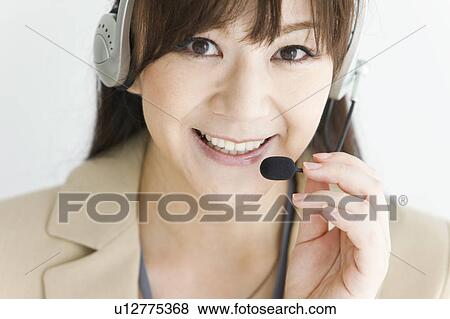 Stock Photo - Female Customer Representative. Fotosearch