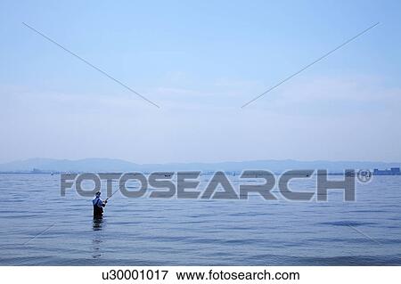 Fisher at Lake Biwa View Large Photo Image Stock Photo - Fisher at Lake Biwa. Fotosearch