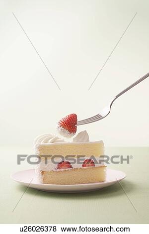 Stock Photo - Fork on Piece of Shortcake. Fotosearch