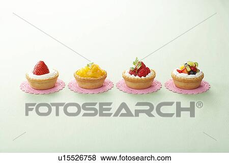 Stock Photo - Four Tarts. Fotosearch