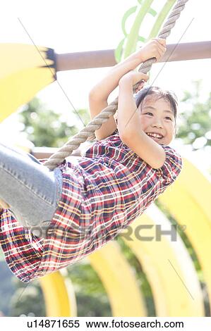 Girl Swining on Rope View Large Photo Image Stock Photography - Girl Swining on Rope. Fotosearch