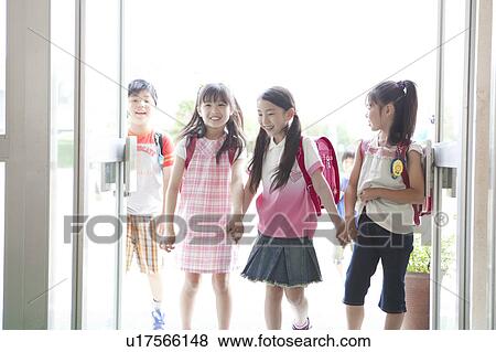 Stock Photo - Girls Arriving at School. Fotosearch