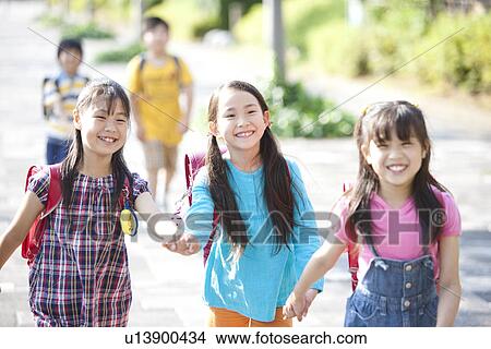 Girls Going to School View Large Photo Image Picture - Girls Going to School. Fotosearch