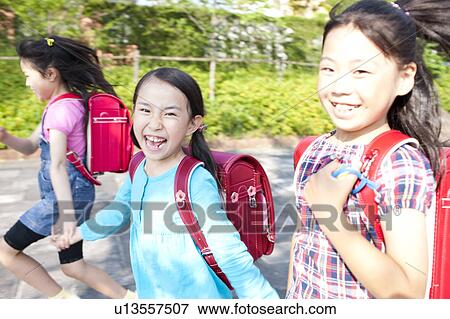 Girls Going to School View Large Photo Image Stock Photo - Girls Going to School. Fotosearch