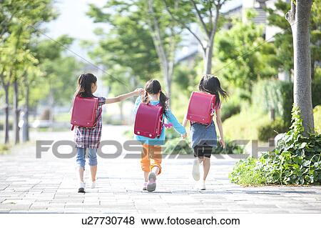 Stock Photo - Girls Going to School. Fotosearch
