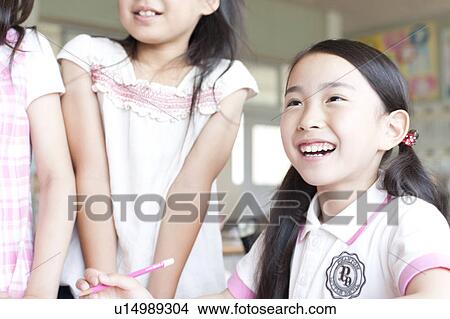 Picture - Happy Schoolgirls. Fotosearch