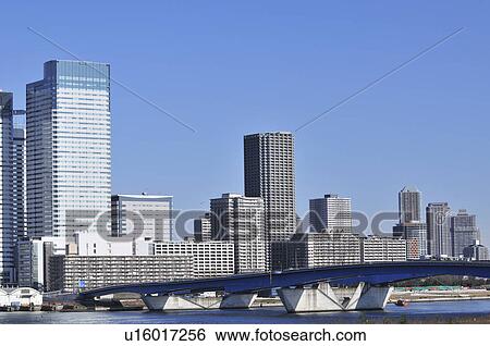 Stock Photograph - Harumi Skyline Seen from Toyosu. Fotosearch