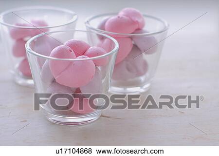 Stock Photo - Heart shape meringue in glass. Fotosearch
