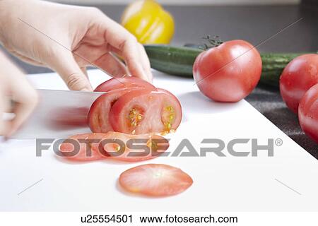Human Hand Chopping Tomato View Large Photo Image Stock Image - Human Hand Chopping Tomato. Fotosearch