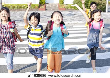 Kids crossing street, Japan View Large Photo Image Stock Photograph - Kids crossing street, Japan. Fotosearch