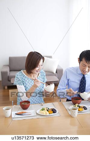 Mid Adult Couple Having Breakfast View Large Photo Image Stock Image - Mid Adult Couple Having Breakfast. Fotosearch
