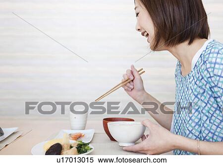 Mid Adult Woman Having Breakfast View Large Photo Image Stock Photography - Mid Adult Woman Having Breakfast. Fotosearch