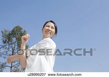 Mid Adult Woman Stretching View Large Photo Image Stock Photo - Mid Adult Woman Stretching. Fotosearch