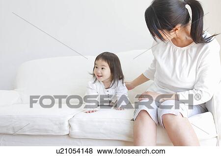 Mid Adult Woman with Baby Girl View Large Photo Image Stock Photo - Mid Adult Woman with Baby Girl. Fotosearch